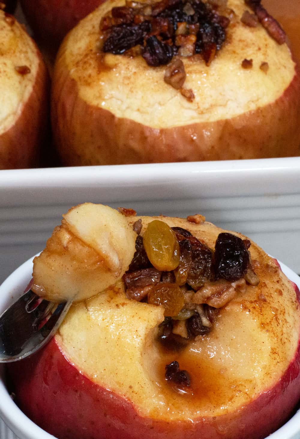 Simple oven-baked apple cut open with a fork