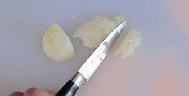 chopping onion for meatballs