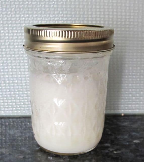 shaking up milk before frothing it in jar
