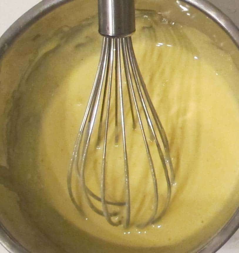 whisking ingredients for pastry cream