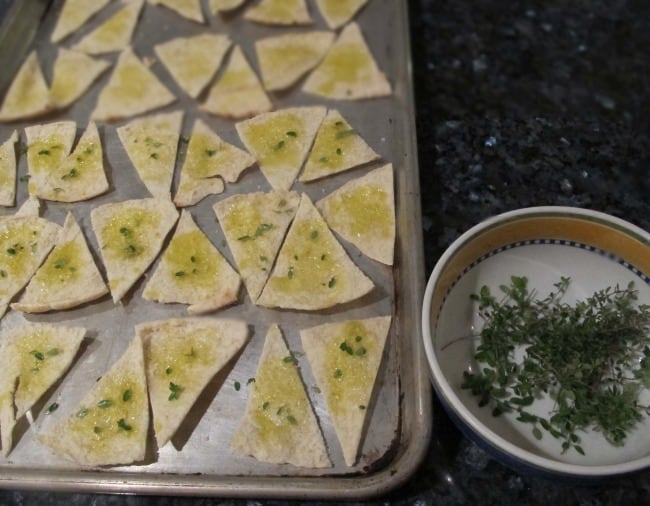 adding herbs to homemade chips