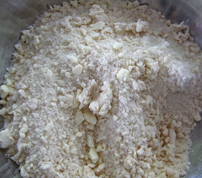 Mixing scone dough for currant scones.