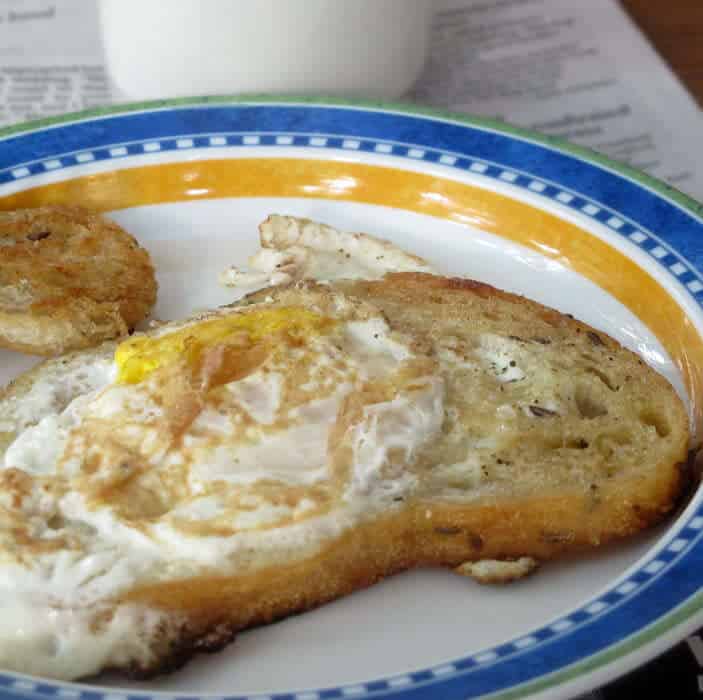 Egg-in-the-hole on a plate, ready to eat