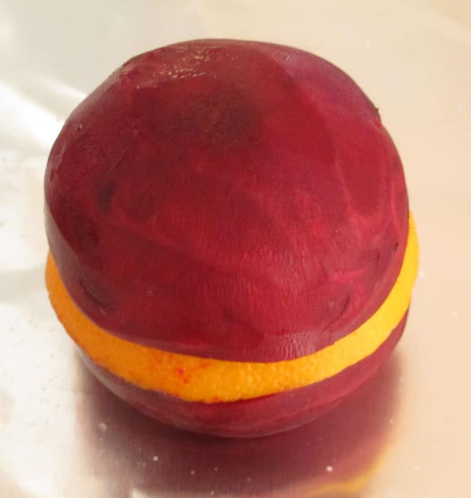 Adding a slice of orange keeps the beet moist while cooking. 