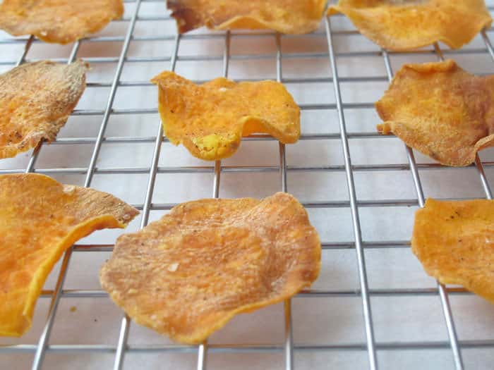Letting baked sweet potato chips cool after baking. 
