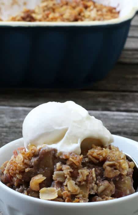 Gluten-free Rhubarb, Apple, and Pear Crisp topped with a scoop of ice cream. | Mother Would Know 