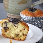 Sour cream muffins with chocolate chunks and cherry, plus a cup of coffee