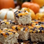 Rice krispy treats topped with dried apricots and mini chocolate chips | Mother Would Know