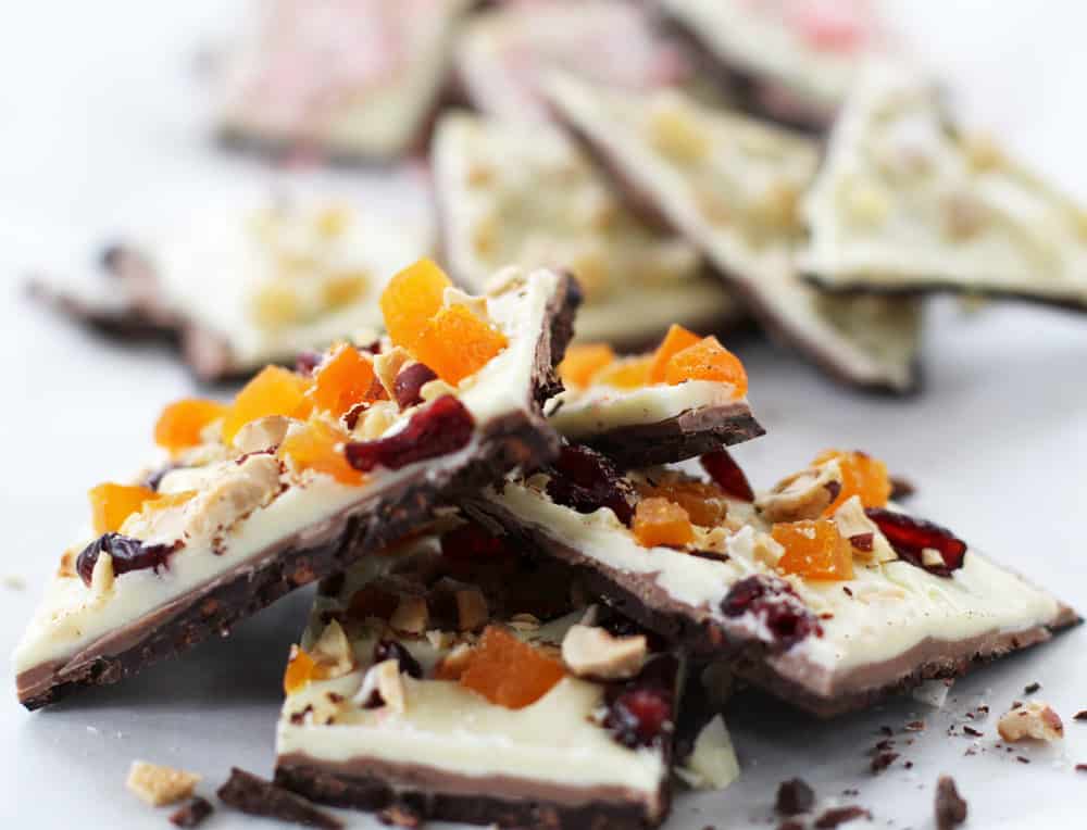 Dried fruit and hazelnuts top this holiday triple chocolate bark.