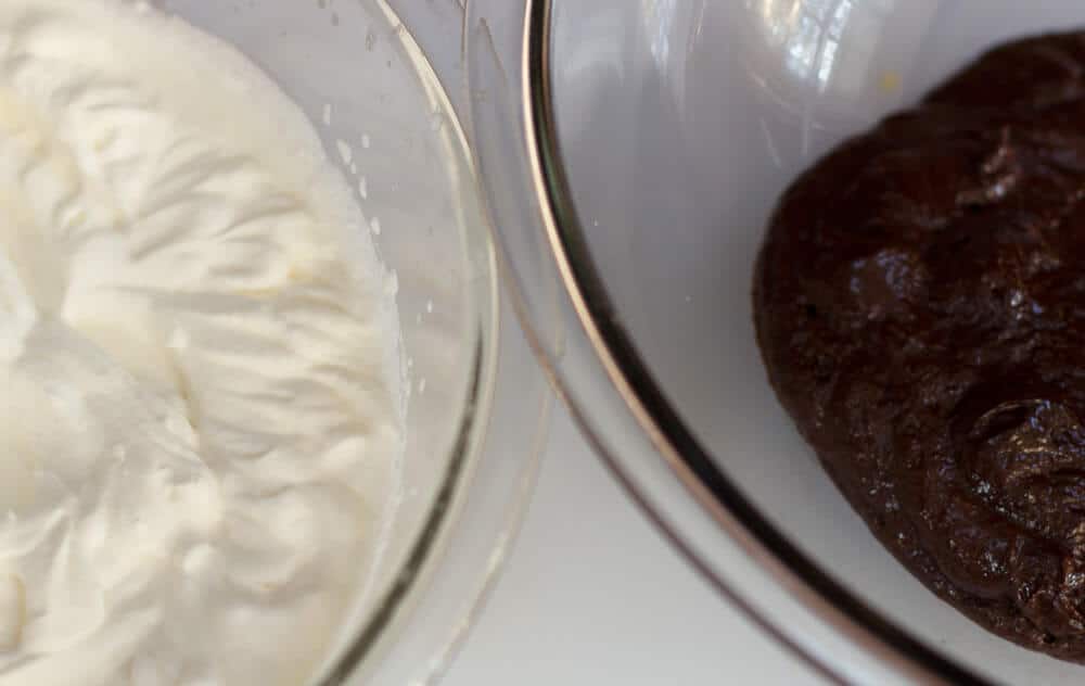 Chocolate and egg yolk mixture with whipped cream, ready to mix for chocolate .mousse