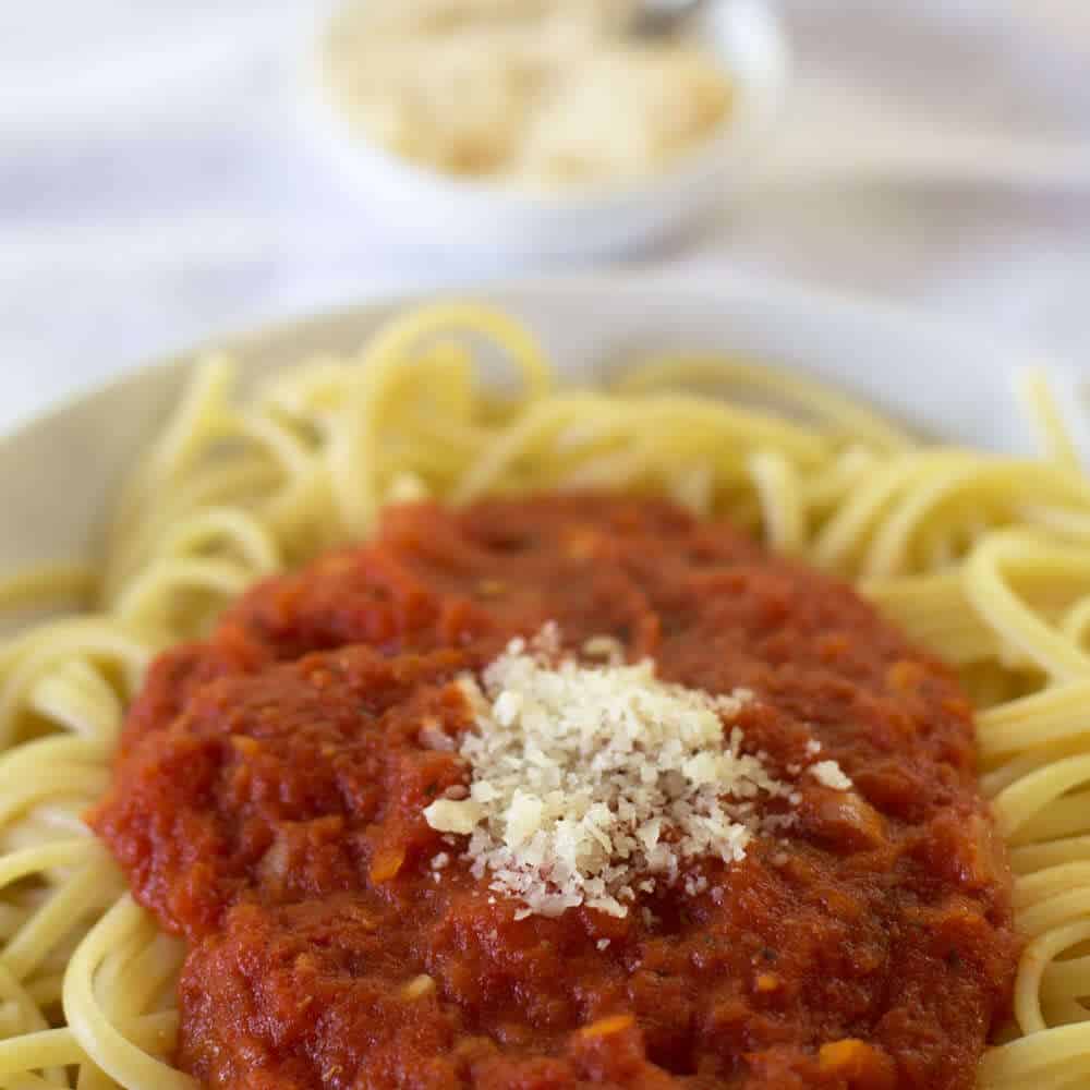 Simple Canned Tomato Pasta Sauce - a perfect topping for pasta or sauce for lasagna, eggplant parmigiana, or stuffed shells. Mother Would Know