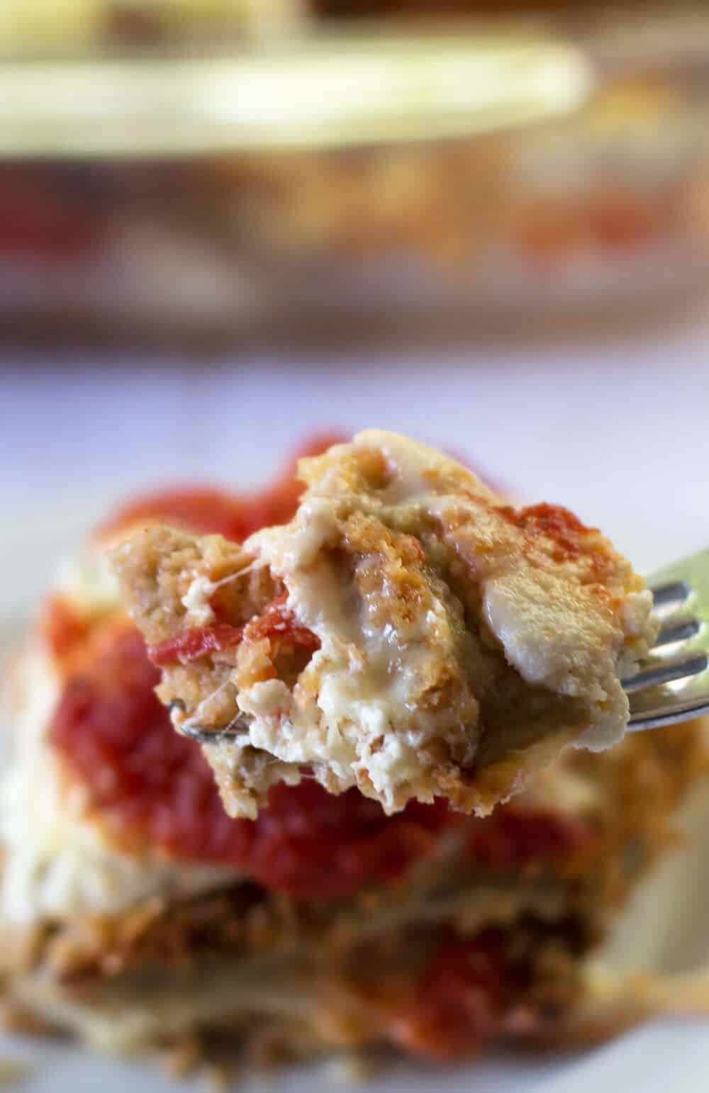 Layered eggplant parmigiana is the perfect way to combine eggplant, tomato sauce and cheeses. Melted together, they form an irresistible combination your family and friends are sure to love. | Mother Would Know