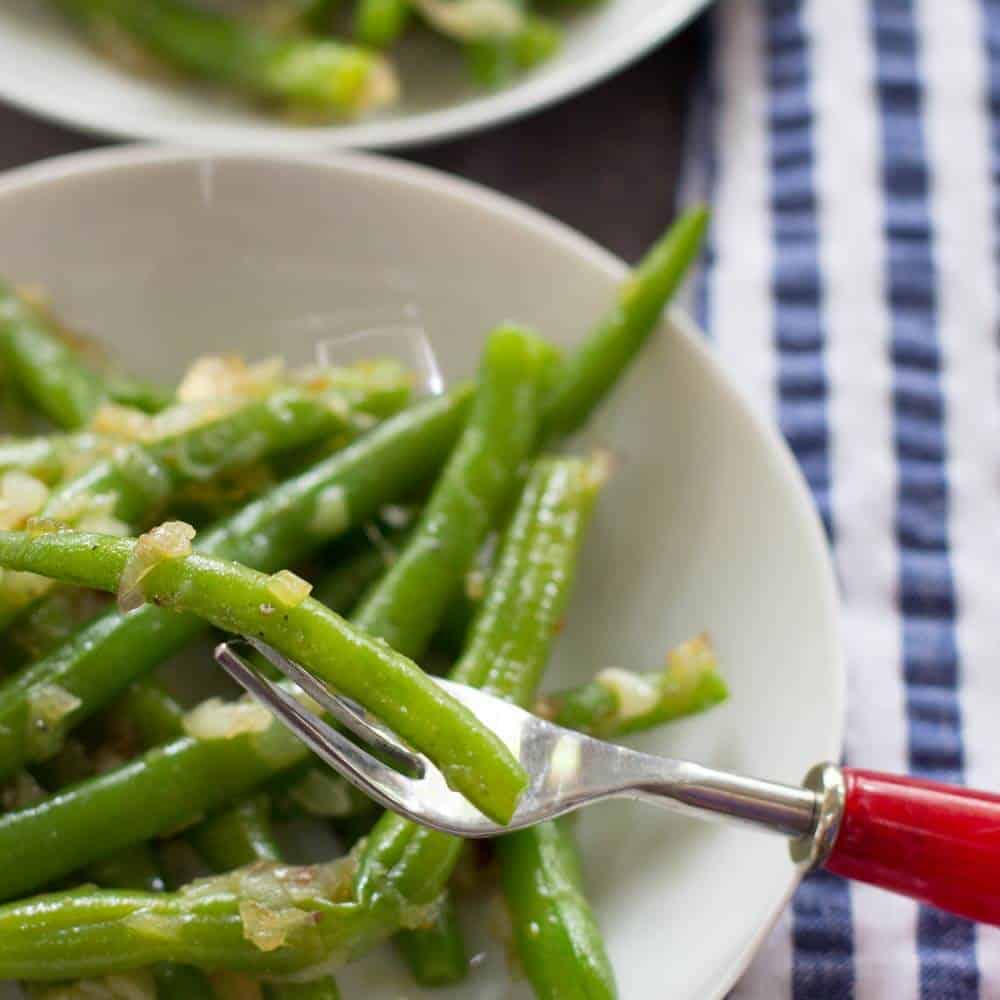 String Beans and Shallots on fork 