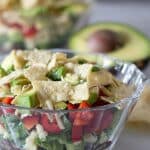Make-Ahead Layered Southwestern Salad done in glass bowl | Mother Would Know