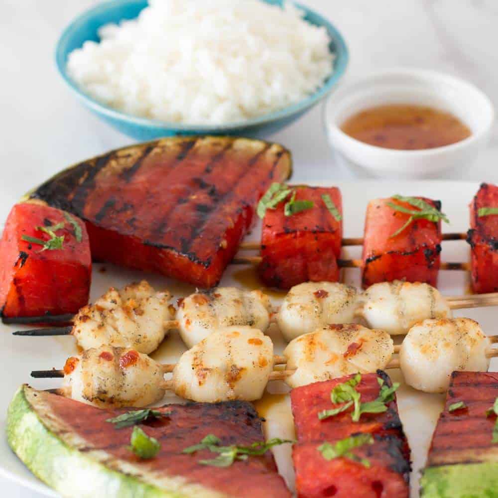 Grilled Watermelon Scallop Shish Kebobs with rice and extra sauce. 
