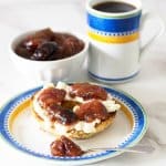 Fresh fig compote on a bagel with coffee