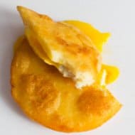 Arepa de Huevo: Fried Corn Cake & Egg Sandwich