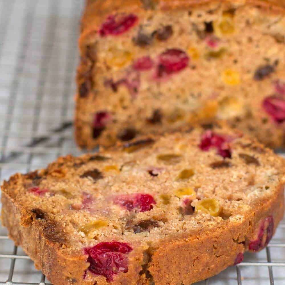A slice of Low Fat Cranberry Applesauce Loaf