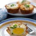 Cheesy hash brown egg nest opened to show the inside of the egg