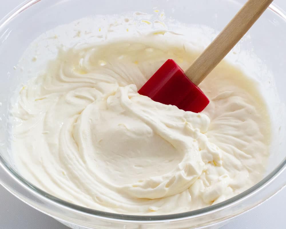filling mixed in a bowl for no-bake lemon mascarpone cheesecake