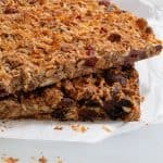 2 batches of dried fruit & nut bars stacked at an angle