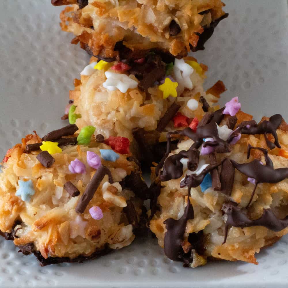 a few colorful Passover coconut macaroons on a plate