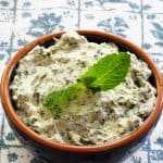 a bowl of mint basil ricotta dip