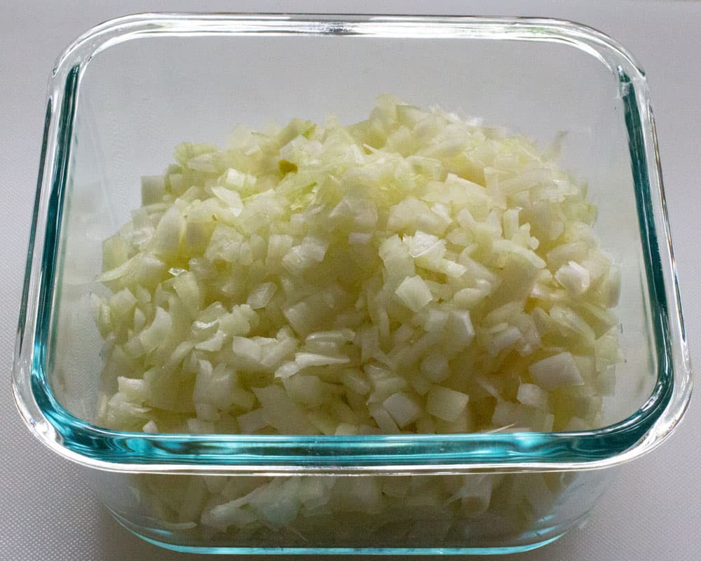 container of diced onions for pletzel