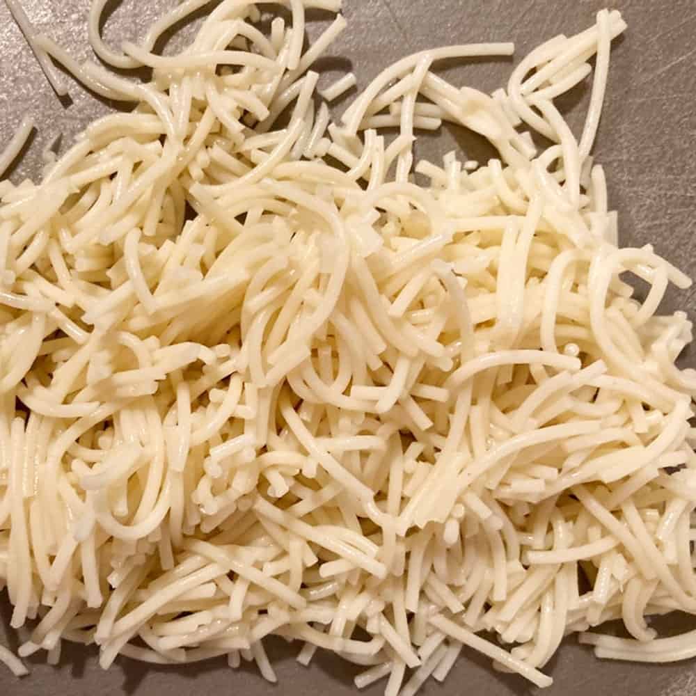angel hair cooked and cut up for chocolate pasta 