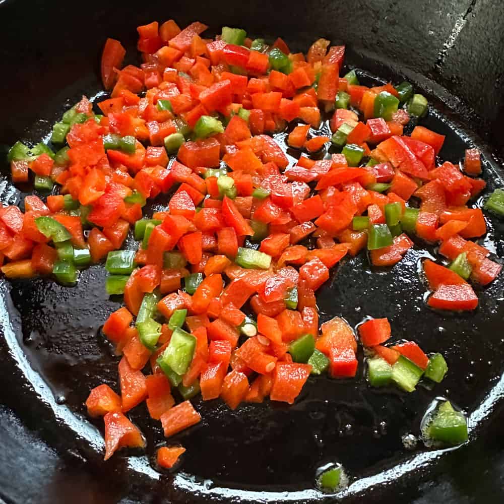 sauteeing pepper (red and jalapeno) for loaded cornbread