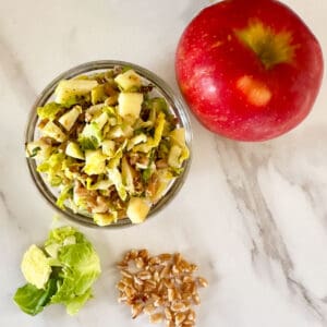 overhead shot of farro and brussels sprouts with apple, plus those 3 major ingredients